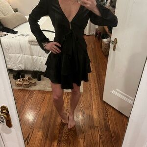 The Impeccable Pig Black Tiered V-Neck Mini Dress